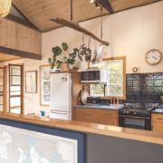 Cooking area: A perspective from the kitchen looking out over cooking area (electric stove top, grill, and oven.