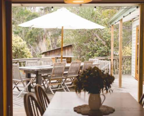 Patio Dining: A dedicated outdoor entertainment space with a large table, perfect for alfresco dining.